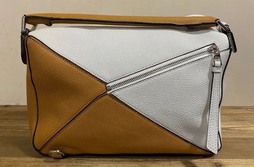 Loewe Large Puzzle Bag (Category: Luxury Bags & Wallets) located in Quezon City. Submitted by __12345 (Listing ID 1334348643, Image 2). Description: ON HAND - guaranteed authentic or money back - 9.9/10 like new condition - inclusions: dustbag - can do meet ups/delivery - detailed photos available upon request open to other bag requests! just send a pm 💌🛍️.