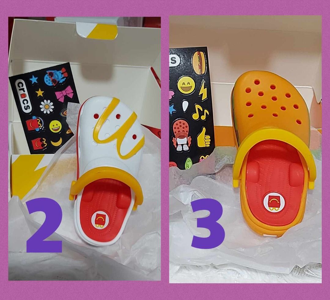 Mc Donalds collab Crocs Happy Meal (Category: Character Goods) located in Pasig City. Submitted by loveMYshop2022 (Listing ID 1328335467, Image 1). Description: Mc Donalds collab Crocs Happy Meal 2. Golden Arches Crocs Toy (White) 3. Burger Crocs Toy .