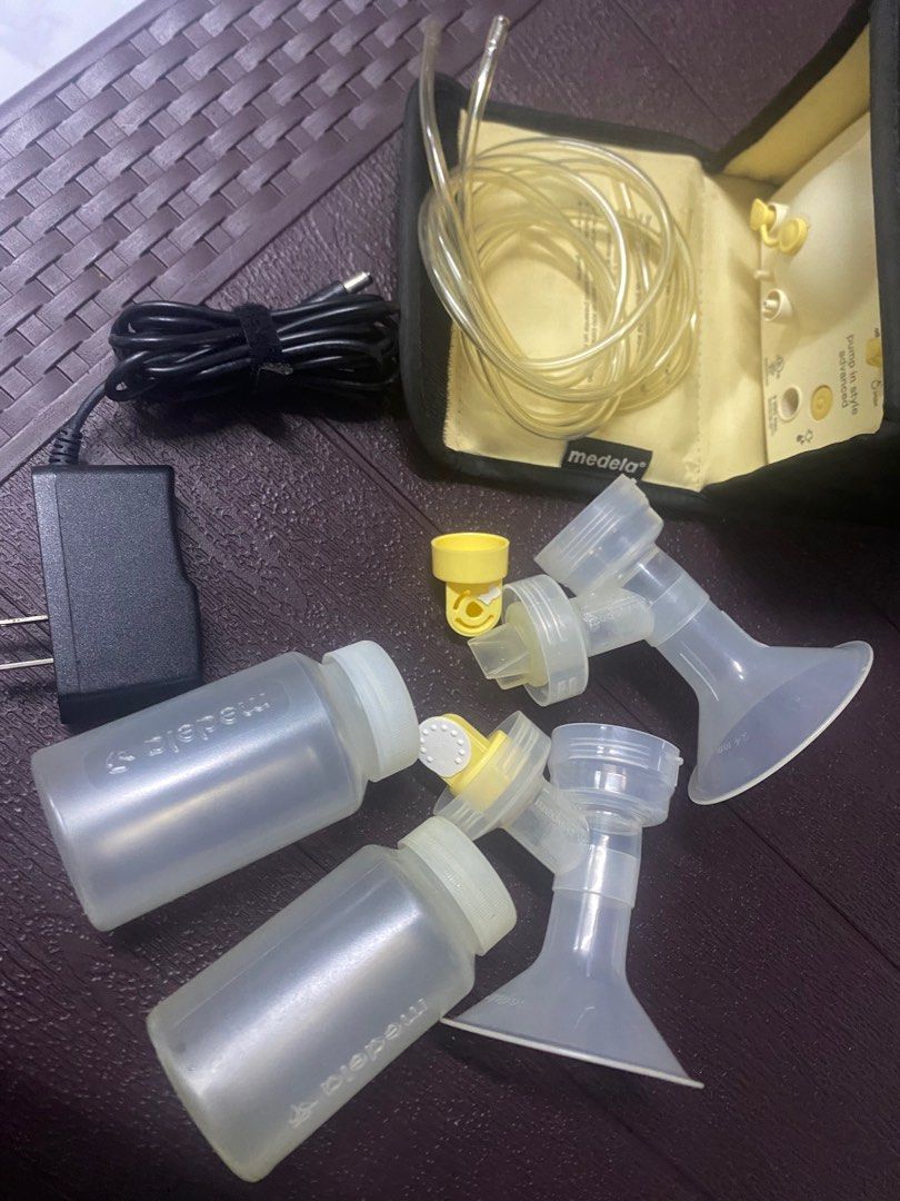 Medela Pump in Style Advance Preloved (Category: Breastfeeding & Bottle Feeding) located in Manila. Submitted by smda_10 (Listing ID 1334298238, Image 3). Description: Rfs: decluttering In good condition ang motor pump. Sira ang isang membrane. 2 tubes and 2 milk storage bottle are included. .