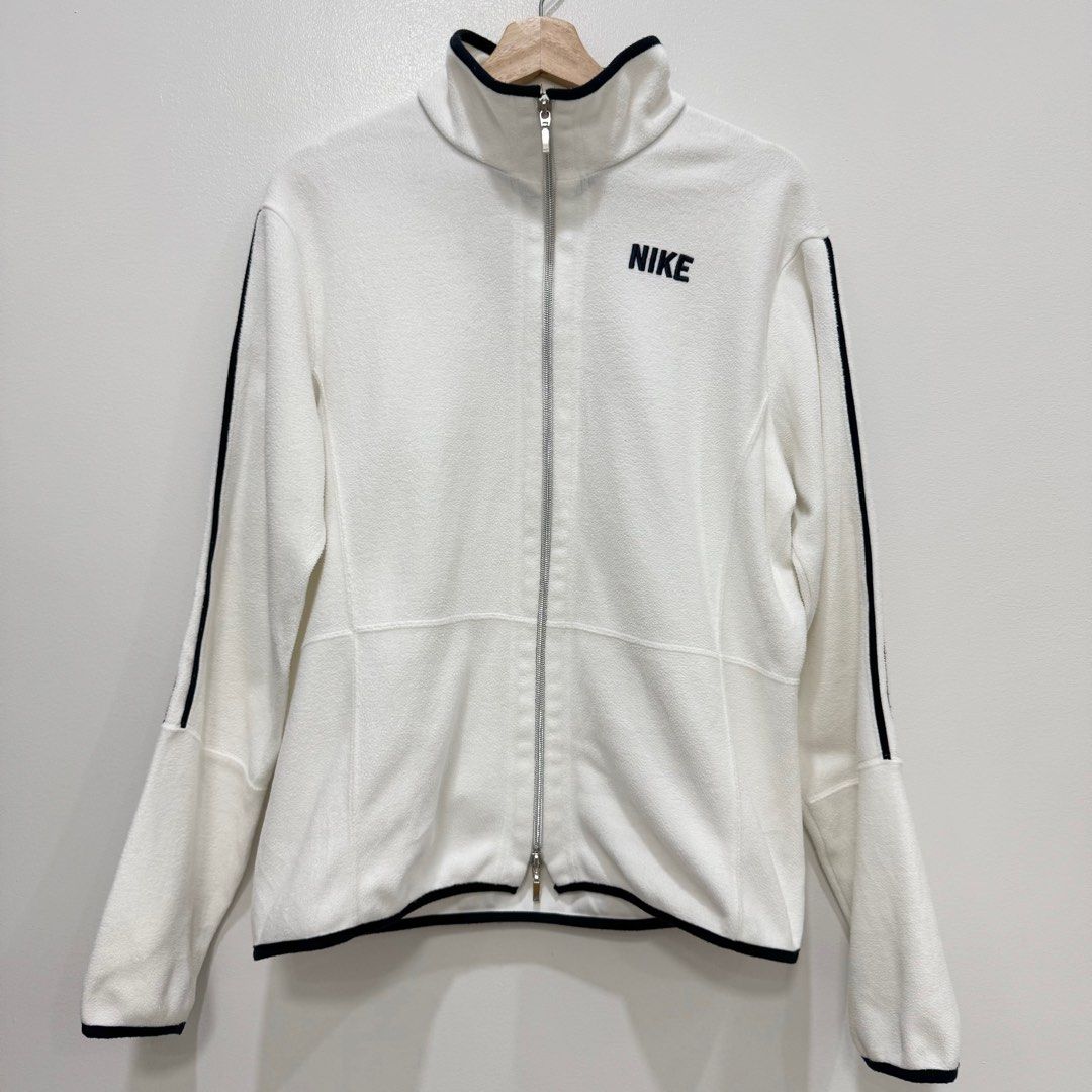 Nike Fleece Jacket (Category: Coats, Jackets and Outerwear) located in Caloocan City. Submitted by _seven (Listing ID 1334246176, Image 1). Description: Nike Fleece Jacket Size: XL on tag (fits M) Dimensions: W-21 L-26 Condition: 9/10 Minor Issue: Yellowing on the neck part .