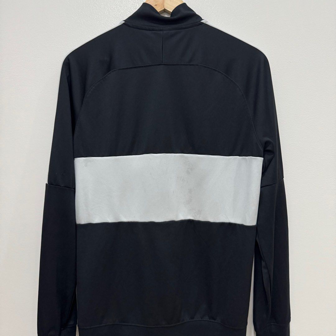 Nike Track Jacket (Category: Coats, Jackets and Outerwear) located in Caloocan City. Submitted by _seven (Listing ID 1334245099, Image 3). Description: Nike Track Jacket Size: M on tag (fits M-L) Dimensions: W-21 L-28 Color Rate: 10/10 Condition: 8.5/10 Issue: Yellow stains (front) Oil Stains (back).