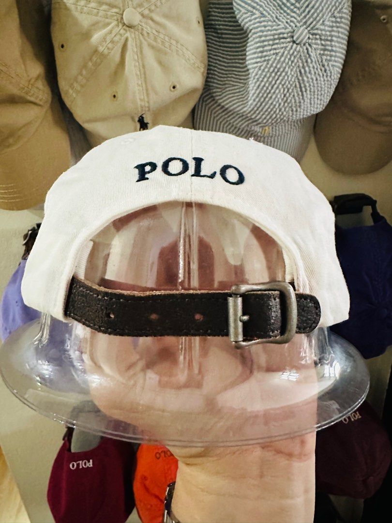 Polo Ralph Lauren Leatherstrap cap White dadhat (Category: Caps & Hats) located in Manila. Submitted by harringtonmnl (Listing ID 1334285029, Image 2). Description: Vintage Polo Ralph Lauren ball cap Authentic with Leatherstrap back White colorway / Blue Pony Excellent condition Color rate 9.5/10 Adult size Price 1500 DM for fast transaction .