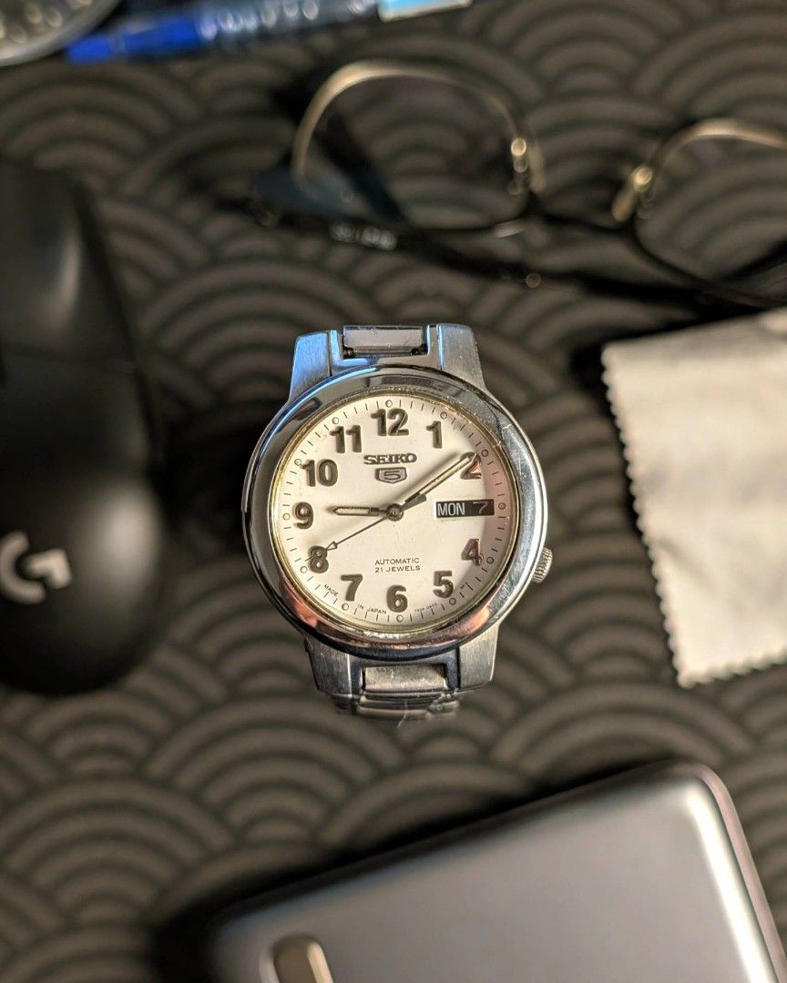 Seiko 5 Automatic Day Date "Clean White" (Category: Luxury Watches) located in Caloocan City. Submitted by renderthisnthat (Listing ID 1334357490, Image 1). Description: FOR SALE Vintage Seiko 5 Automatic Day Date . . Vintage watch, minor scratches are to be expected. Meet ups along QC or Shipping through J&T . 🏷️3500 PHP.