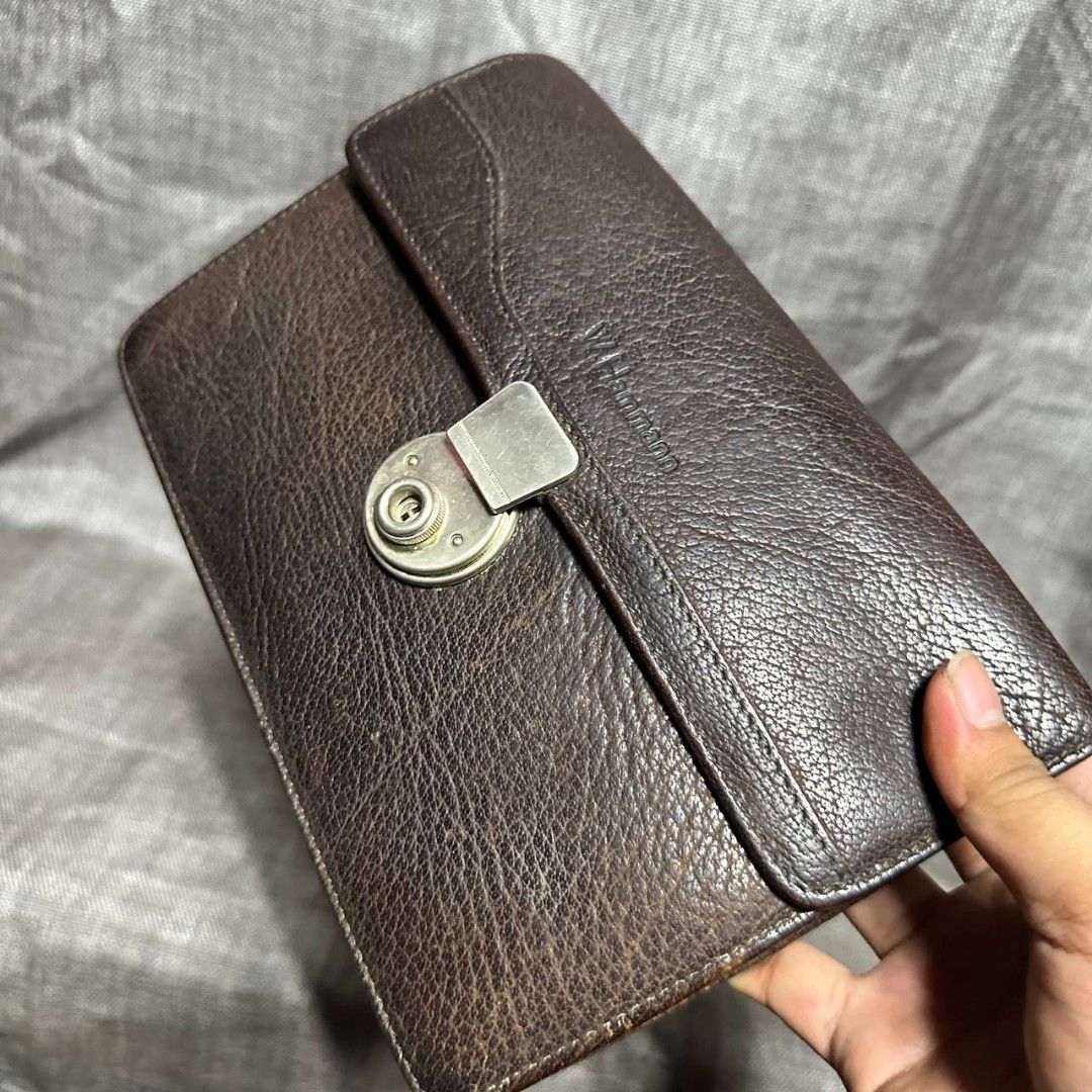 W. Hammann clutch bag (Category: Luxury Bags & Wallets) located in Manila. Submitted by greyinfash06839 (Listing ID 1334361643, Image 3). Description: 🤍Price: 2,900 pesos only 🤍Item: W. Hammann clutch bag 🤍Brand: W. Hammann 🤍Matirial: Leather 🤍Quality: Original 🤍color: Brown 🤍Size: Small 🤍Dimension. H: 6 L: 9 W: 2 🤍Sex: For Men 🤍Issue: Vintage 🤍Condition Rate: 8/10 🤍Other info:.