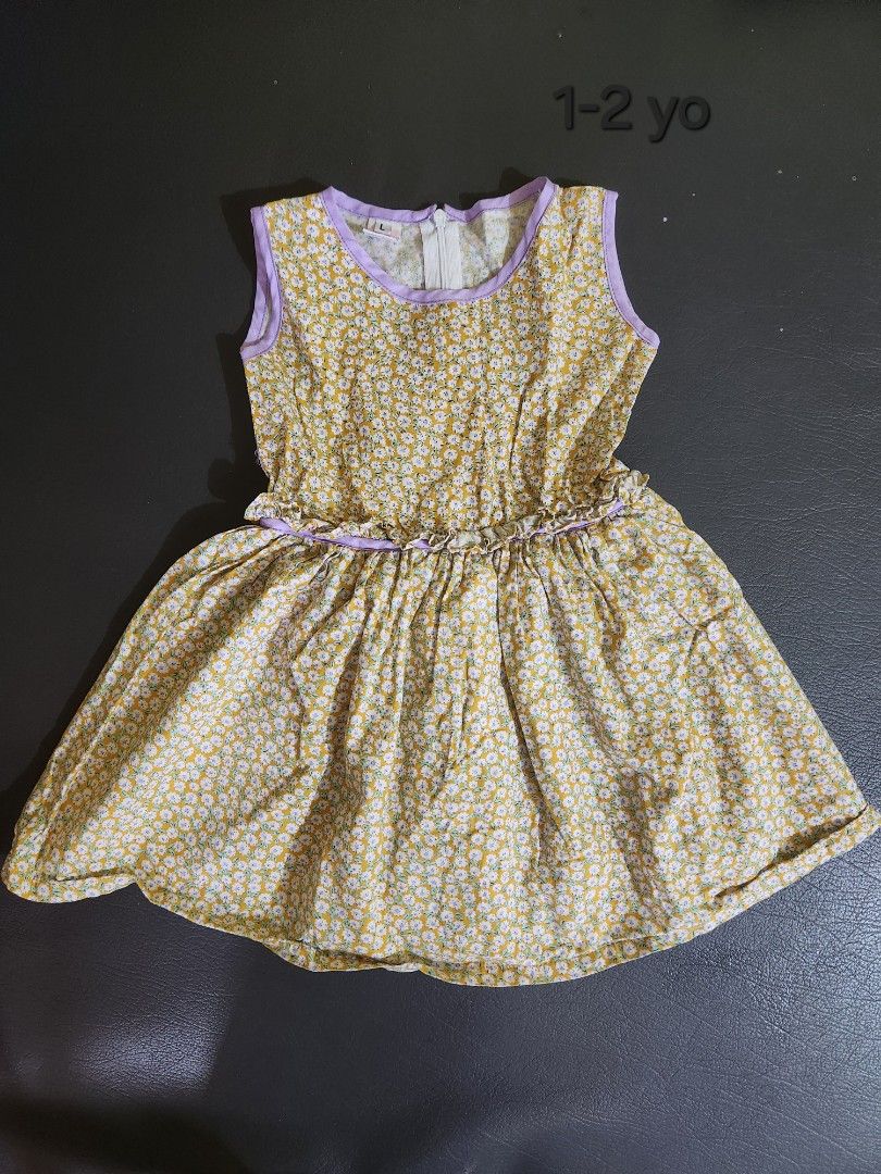 Yellow floral dress (Category: Babies & Kids Fashion) located in Iloilo. Submitted by kmina83 (Listing ID 1334322134, Image 1). Description: yellow floral dress with lavender piping.