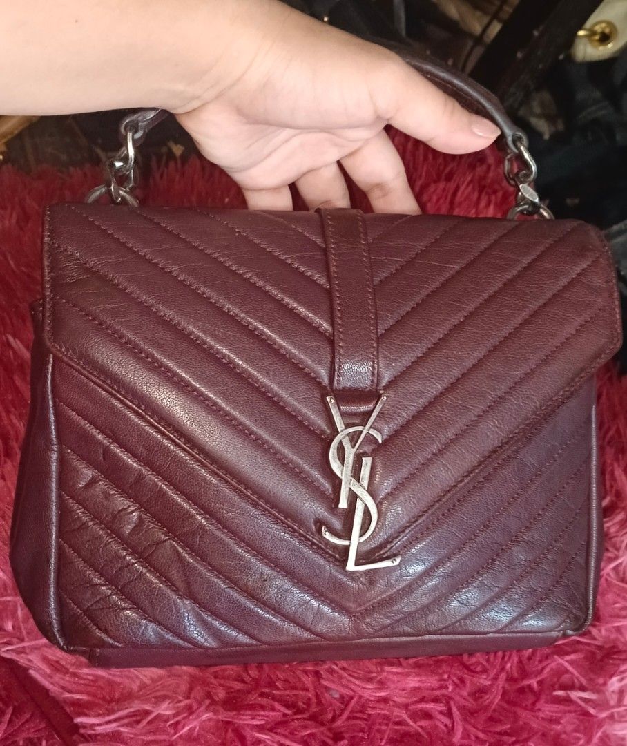 YSL crossbody bag (Category: Luxury Bags & Wallets) located in Legazpi City. Submitted by georgepineda791 (Listing ID 1334297475, Image 1). Description: Crafted from luxurious sheep skin leather, this versatile piece can be styled as a handbag or worn crossbody. Featuring Saint Laurent markings under the zip and on the sling hardware, with three spacious compartments for all your essentials. It has flaws, such as leather fading or color variation