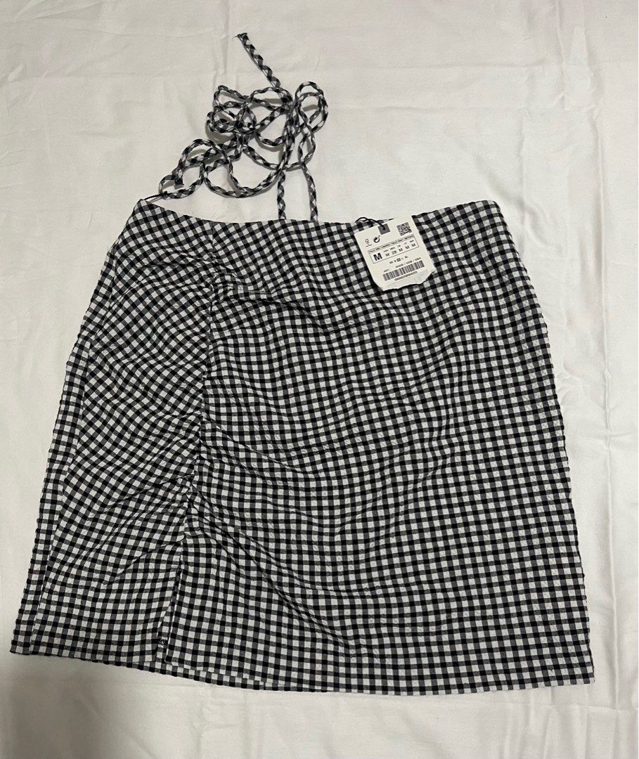 Zara Checked Black and White Tieback Skirt (Category: Skirts) located in Caloocan City. Submitted by jusmmmm (Listing ID 1334267917, Image 1). Description: Authentic Zara, never used, still with tag .