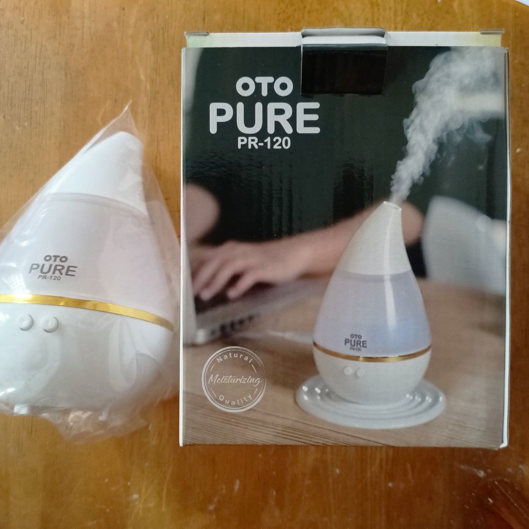 Aroma Diffuser (Category: Irons & Steamers) located in Singapore. Submitted by rrpua (Listing ID 1339010826, Image 1). Description: Brand new OTO PURE PR-120 👍USB port 👍250ml pot 👍 Original price $30, sell at $10.