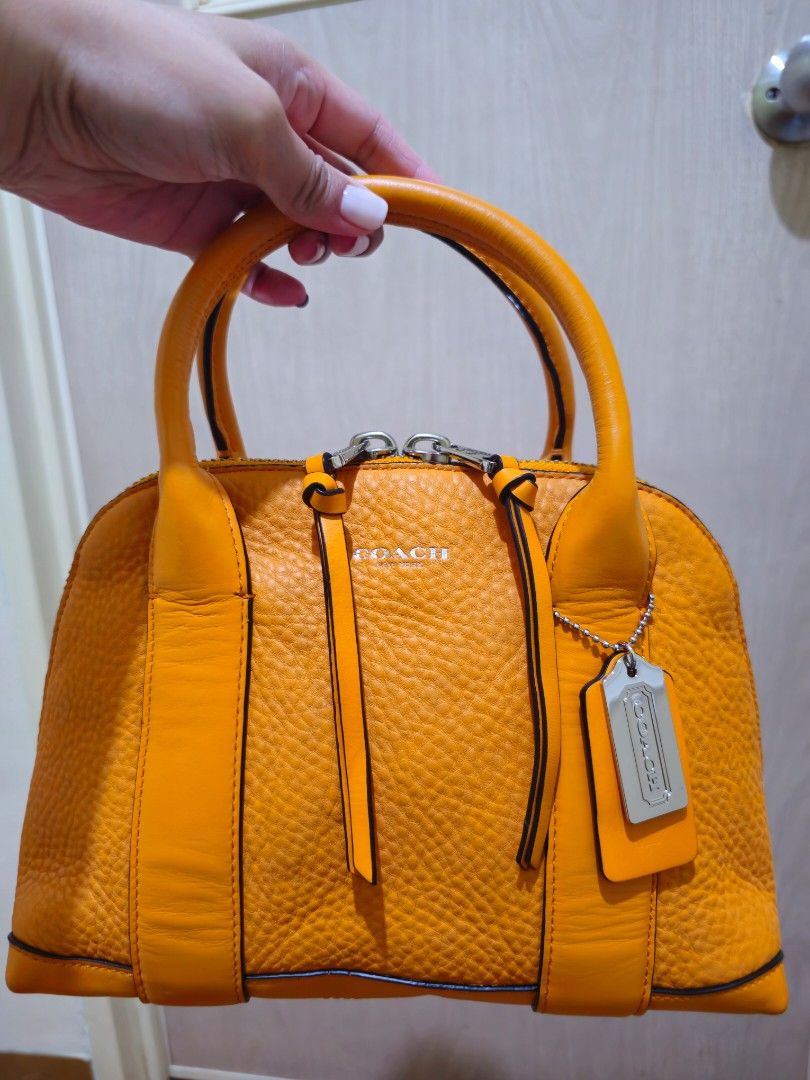 Auth Coach Mini Bleecker Preston Satchel In Mandarin Pebbled Leather (Category: Luxury Bags & Wallets) located in Las Pinas. Submitted by andthelike (Listing ID 1339130992, Image 1). Description: Auth Coach Mini Bleecker Preston Satchel In Mandarin Pebbled Leather Refer to the photos to see the condition of the bag Purchased as preloved but never used..