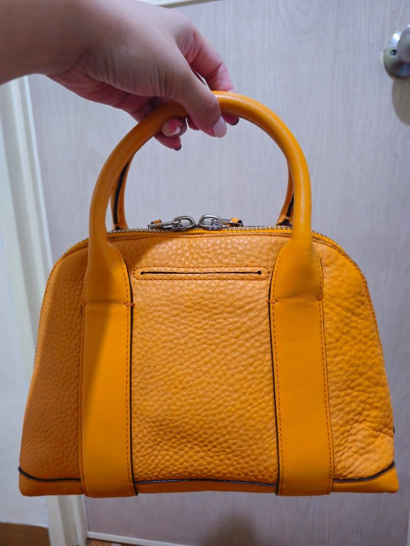 Auth Coach Mini Bleecker Preston Satchel In Mandarin Pebbled Leather (Category: Luxury Bags & Wallets) located in Las Pinas. Submitted by andthelike (Listing ID 1339130992, Image 2). Description: Auth Coach Mini Bleecker Preston Satchel In Mandarin Pebbled Leather Refer to the photos to see the condition of the bag Purchased as preloved but never used..