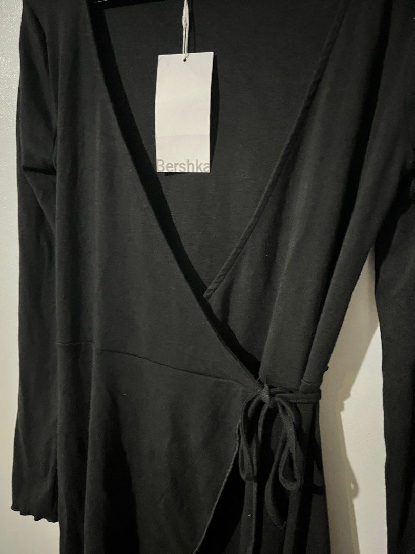 Bershka Mini wrap around Dress (Category: Dresses) located in Bulacan. Submitted by abiee_ (Listing ID 1339004397, Image 3). Description: ORIGINAL BERSHKA PRICE IS NEGOTIABLE Can fit up to L but best fit for M Bought it on sale Please message me if you have any inquiries 😊.