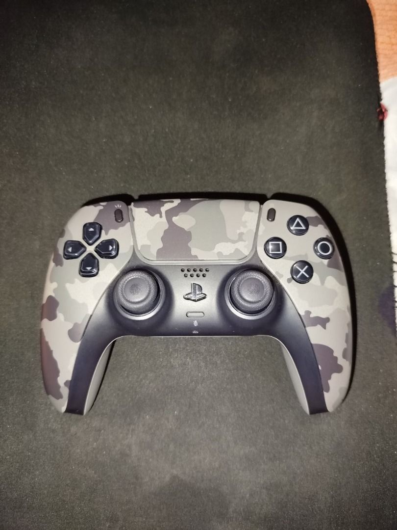 Dualsense PS5 Controller latest release CAMO GRAY [w/ HALL EFFECT analogs] (Category: Controllers) located in Quezon City. Submitted by calibre027 (Listing ID 1339108569, Image 1). Description: Dualsense PS5 Controller latest release CAMO GRAY [w/ HALL EFFECT analogs] 🔥upgraded to Gulikit Hall Effect sensor analogs so no ghosting for life 👉 Very good condition, no issue, no stick drift, pwede itest sa android phone upon meetup 👉Slightly used k
