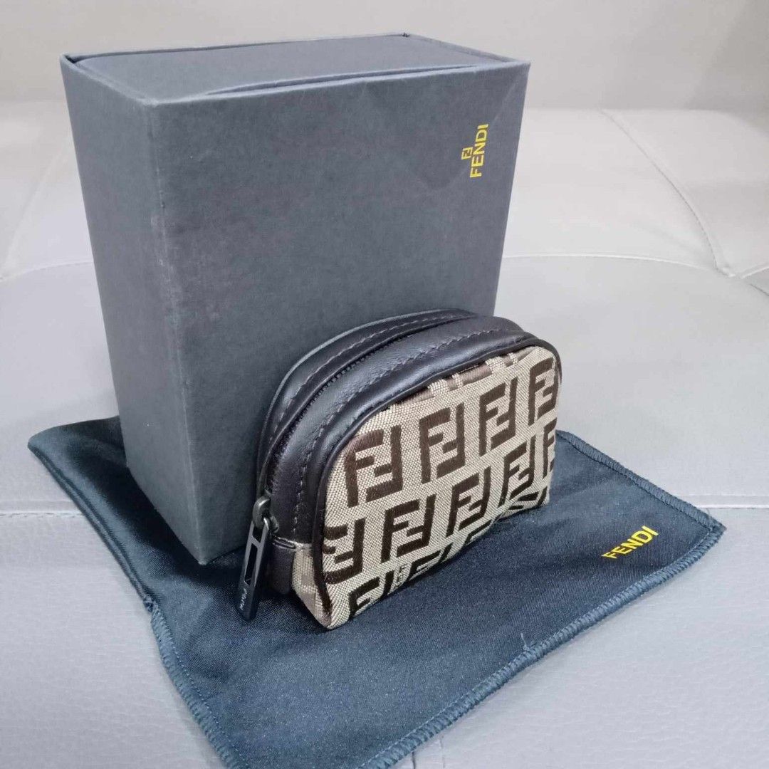 Fendi Monogram Coin Purse (Category: Luxury Bags & Wallets) located in Taguig. Submitted by esa.agustin (Listing ID 1339052948, Image 1). Description: Original Fendi Momogram canvas coin purse. Complete inclusion (box, dust bag and authenticity card. Made in Italy..