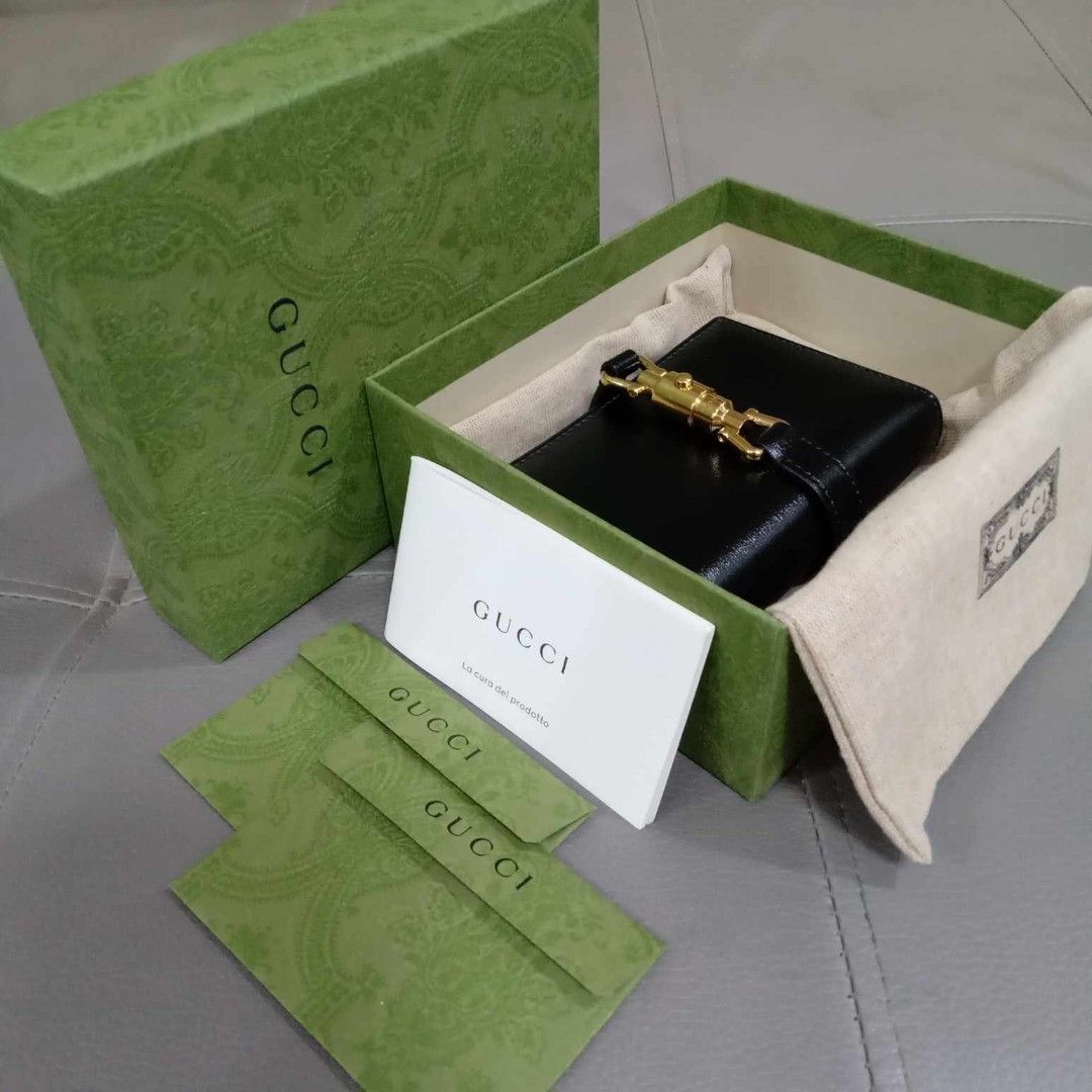 Gucci Jackie Card Case Wallet (Category: Luxury Bags & Wallets) located in Taguig. Submitted by esa.agustin (Listing ID 1339055170, Image 3). Description: Original Gucci Jackie black leather card case wallet. Complete inclusion (box, dust bag, carecard). Made in Italy..
