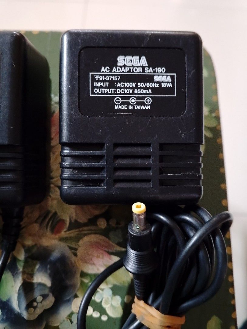 Original SEGA Nintendo AC Adaptor 100V (Category: Nintendo) located in Binangonan. Submitted by stufflikedat (Listing ID 1339045987, Image 2). Description: Original SEGA Mega Drive & Nintendo Famicom AC power adaptor models SA 190, SA 190B & HVC-002, AC input is 100-110v 50/60hz & DC output is 10V 850mA all in working condition for 700 each or 1.8k for 3pcs + shipping.