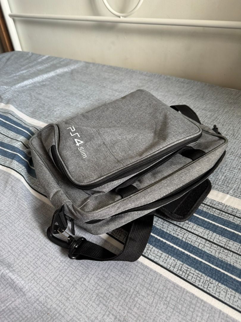 PS4 Slim Bag (Category: PlayStation) located in Pasig City. Submitted by robbiseraphin (Listing ID 1339114889, Image 2). Description: PS4 SLIM Carry-on bag. Only for 500 php _____________________ For any questions kindly PM me or text me at 09150578164. Thanks! .