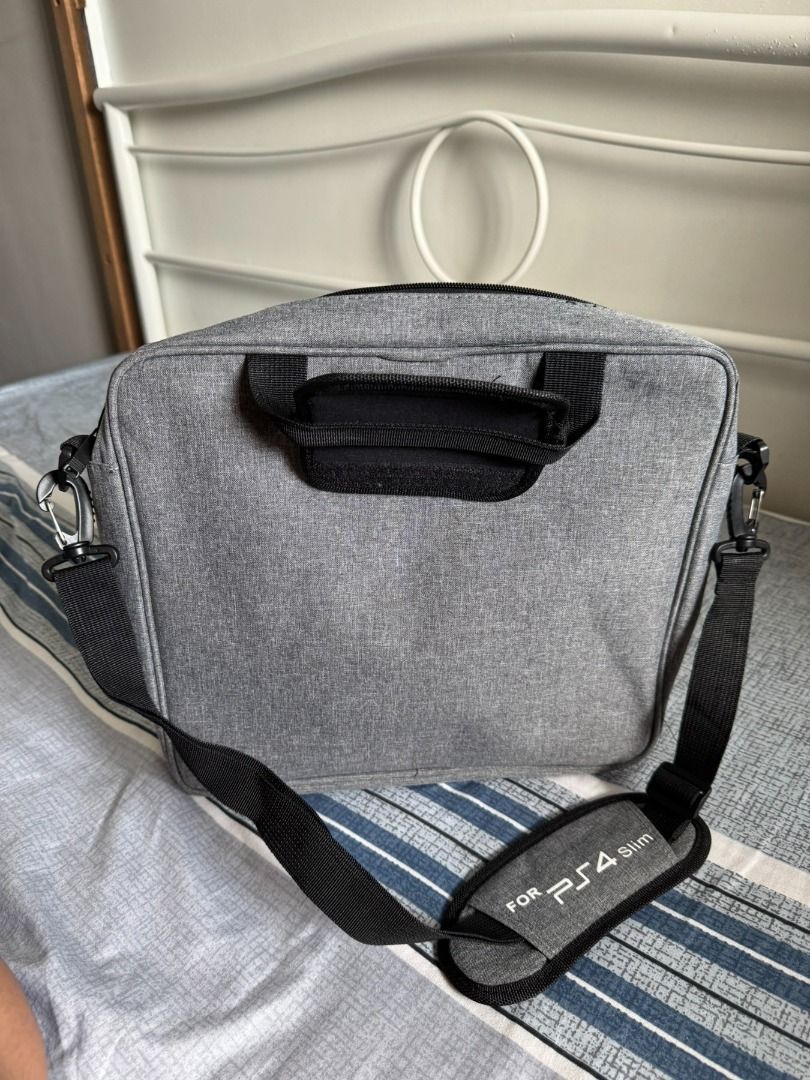 PS4 Slim Bag (Category: PlayStation) located in Pasig City. Submitted by robbiseraphin (Listing ID 1339114889, Image 3). Description: PS4 SLIM Carry-on bag. Only for 500 php _____________________ For any questions kindly PM me or text me at 09150578164. Thanks! .