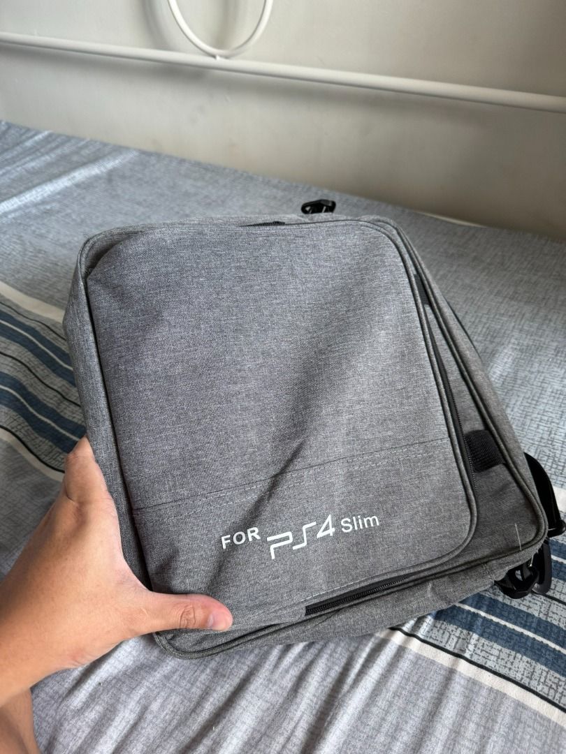 PS4 Slim Bag (Category: PlayStation) located in Pasig City. Submitted by robbiseraphin (Listing ID 1339114889, Image 1). Description: PS4 SLIM Carry-on bag. Only for 500 php _____________________ For any questions kindly PM me or text me at 09150578164. Thanks! .