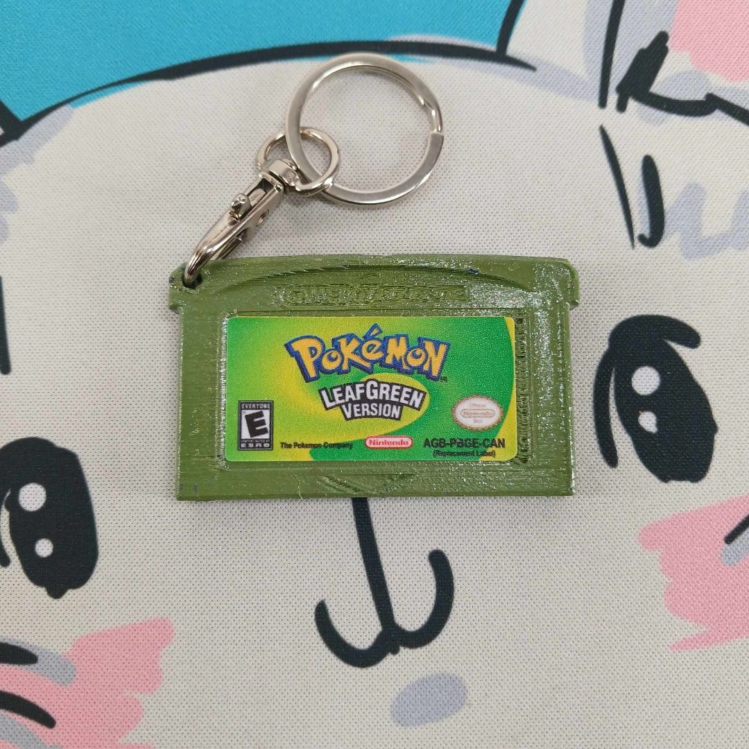3D Printed Gameboy / Gameboy Advance Game Cartridge Keychains (Category: Character Goods) located in Muntinlupa City. Submitted by southrage (Listing ID 1334446036, Image 2). Description: 3D Printed Gameboy / Gameboy Advance Game Cartridge Keychains Game Cartridges Keychain Replica Materials: Filament PLA+ Water Based Acrylic Paint Waterproof Matte Sticker Available Designs: GBA: Golden Sun Megaman: Battle Network 2 Megaman: Battle Network 3 Whit