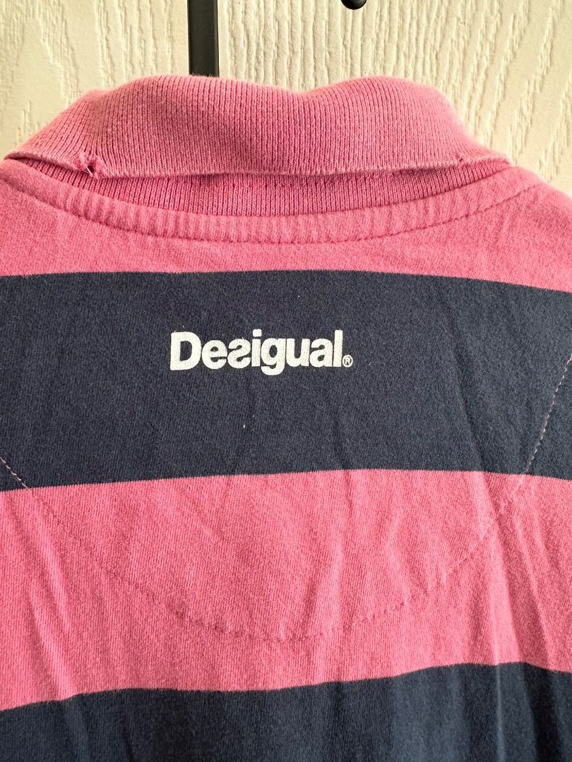 Desingual Blue/Pink Stripe Polo Shirt, Medium (Category: Tshirts & Polo Shirts ) located in Pasay City. Submitted by cas_io (Listing ID 1334385207, Image 2). Description: Desingual Blue/Pink Stripe Polo Shirt, Bought in EU and been hidden in the cabinet for a while. Rarely use, owner left overseas already. Payment and Shipping will be through LBC. COD or COP. .