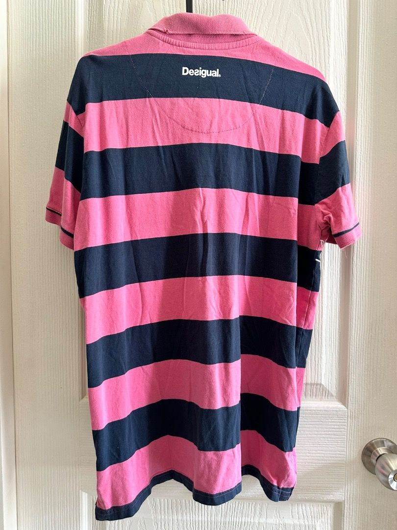Desingual Blue/Pink Stripe Polo Shirt, Medium (Category: Tshirts & Polo Shirts ) located in Pasay City. Submitted by cas_io (Listing ID 1334385207, Image 3). Description: Desingual Blue/Pink Stripe Polo Shirt, Bought in EU and been hidden in the cabinet for a while. Rarely use, owner left overseas already. Payment and Shipping will be through LBC. COD or COP. .