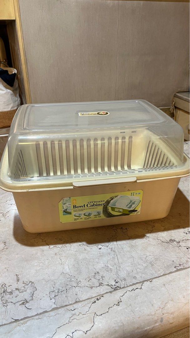 Dish cabinet drying rack (Category: Food Organization & Storage) located in Manila. Submitted by nmpc116 (Listing ID 1334424920, Image 3). Description: Plastic material Rack is removable and has grooves for dishes 16.5in length 12.5in width 10 in tall .