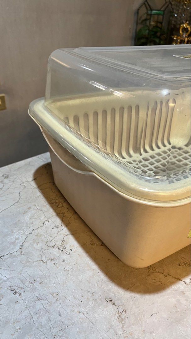 Dish cabinet drying rack (Category: Food Organization & Storage) located in Manila. Submitted by nmpc116 (Listing ID 1334424920, Image 2). Description: Plastic material Rack is removable and has grooves for dishes 16.5in length 12.5in width 10 in tall .