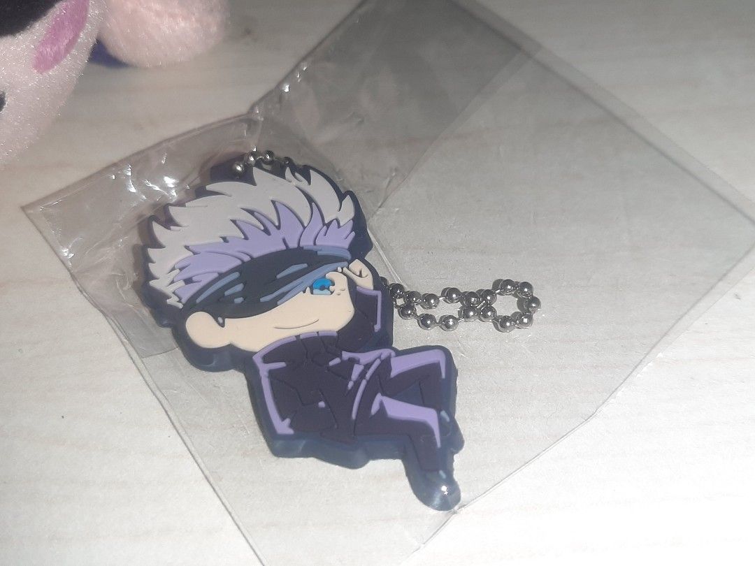 Gojo Satoru plush and rubber keychain (official) (Category: Plushies & Soft Toys) located in Tarlac. Submitted by fyozaienthusiast_ (Listing ID 1334411797, Image 3). Description: jujutsu kaisen Gojo satoru set for Php 280.00 mod: jnt/lbc mop: gcash.