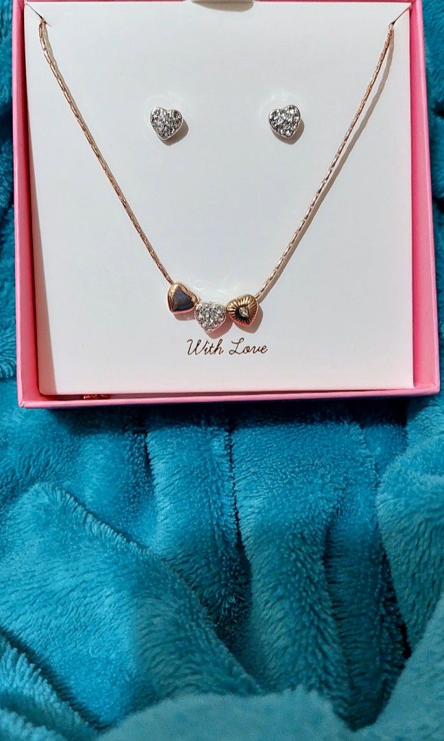 HEART TRIO EARRING AND PENDANT SET (Category: Necklaces) located in Zamboanga. Submitted by Chuchai (Listing ID 1334542271, Image 1). Description: BRAND NEW HEART TRIO EARRING AND PENDANT SET From:BUCKLEY LONDON Rfs:Decluttering.