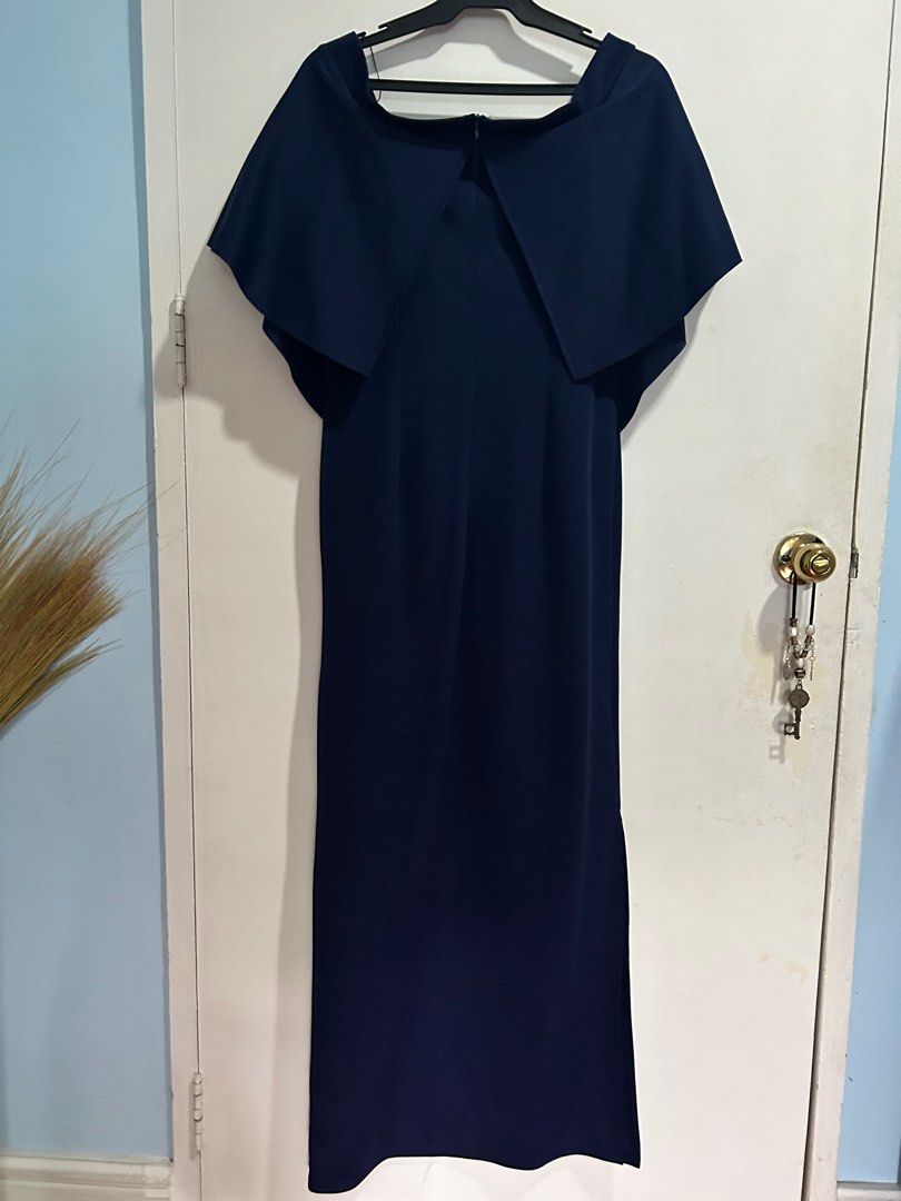 Ishta Formal Gown (Category: Evening dresses & gowns) located in Makati City. Submitted by declutterphilia (Listing ID 1334446563, Image 3). Description: Color: Dark blue Worn once only Original price in Landmark is ₱3900.