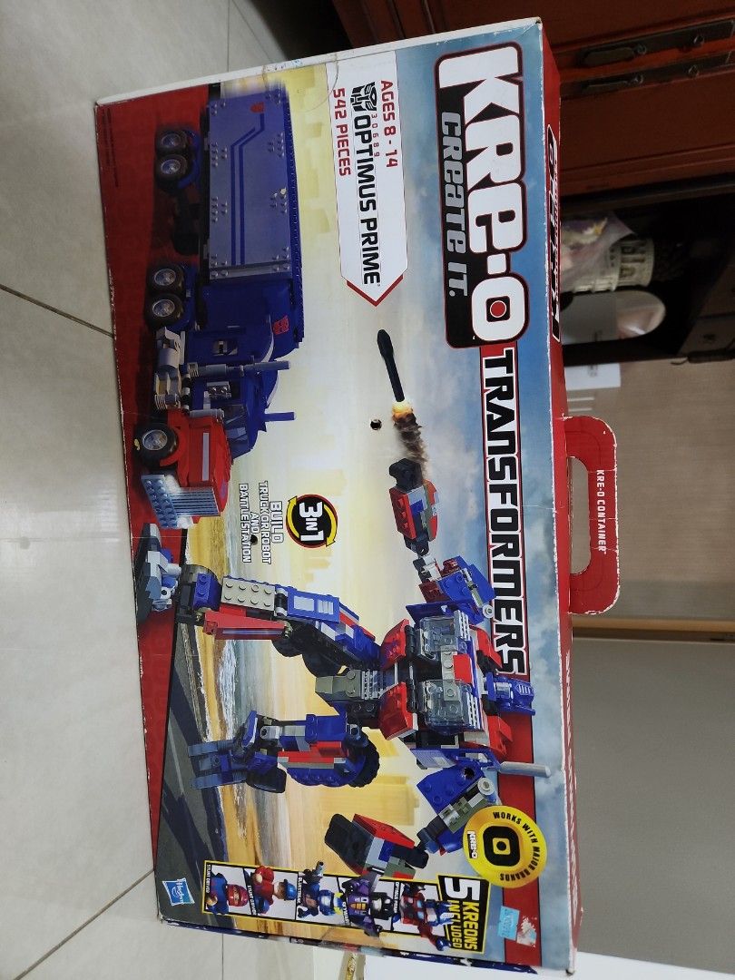 KRE-O OPTIMUS TRANSFORMERS (Category: Lego & Building Sets) located in Singapore. Submitted by mayatan19 (Listing ID 1334498708, Image 2). Description: lego unpack in box . new vintage bought at $380 . 3 in 1 Optimus Prime Transformers . 542 pieces lego original brand.