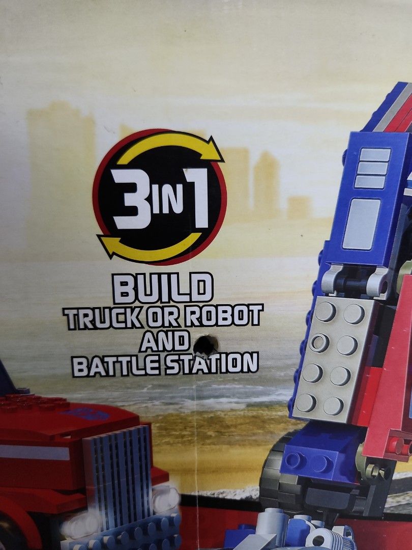 KRE-O OPTIMUS TRANSFORMERS (Category: Lego & Building Sets) located in Singapore. Submitted by mayatan19 (Listing ID 1334498708, Image 3). Description: lego unpack in box . new vintage bought at $380 . 3 in 1 Optimus Prime Transformers . 542 pieces lego original brand.