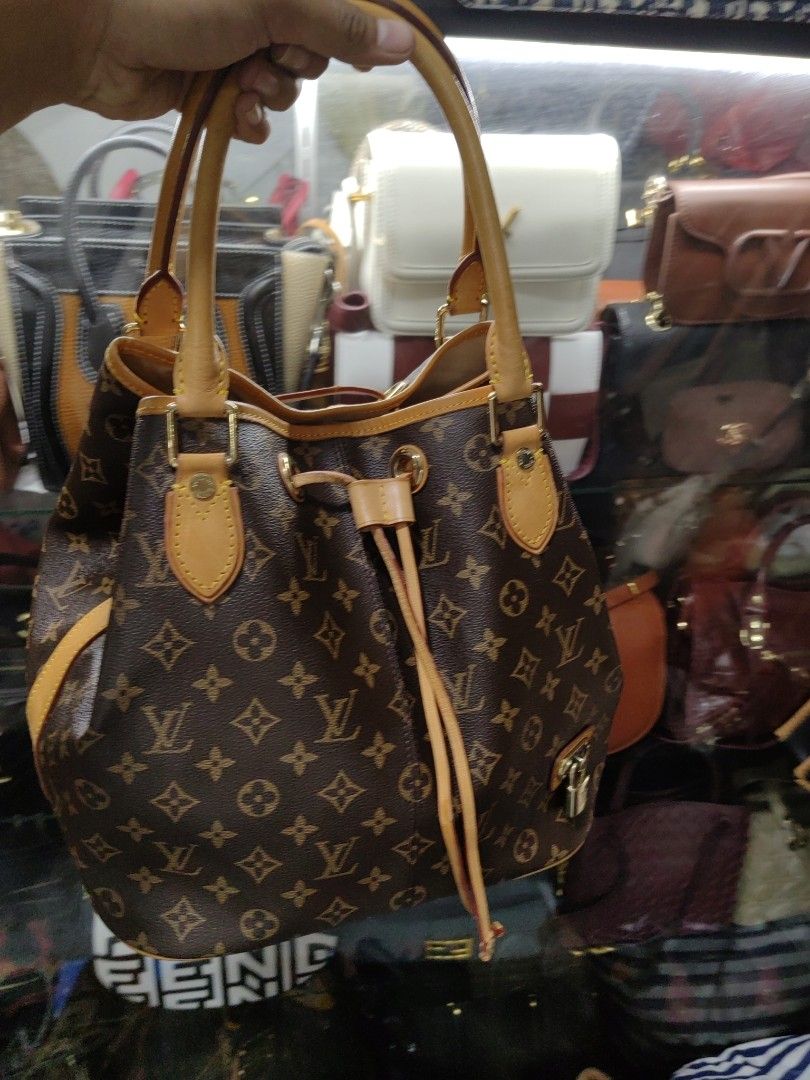 Lv bucket sling bag online