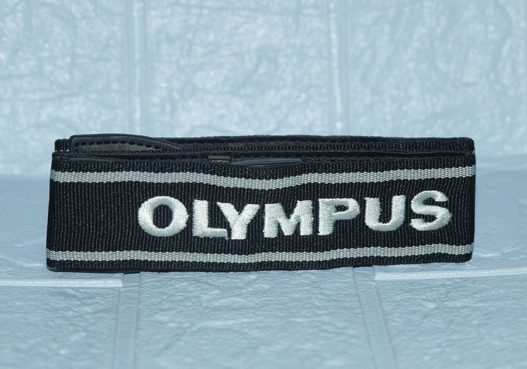 Nikon and Olympus Neckstraps (Category: Camera Bags & Carriers) located in Quezon City. Submitted by Mr._Vintageous (Listing ID 1334415308, Image 3). Description: For Sale! Original Neckstraps from Nikon And Olympus Cameras. Brand new condition. Never used. Actual pictures posted. Olympus Embroidered Design. 550.00 Pesos Each. Meet up along SM Fairview. Shipping available at buyer's expense. Buyer books the courier-rider. Payment upon item pickup