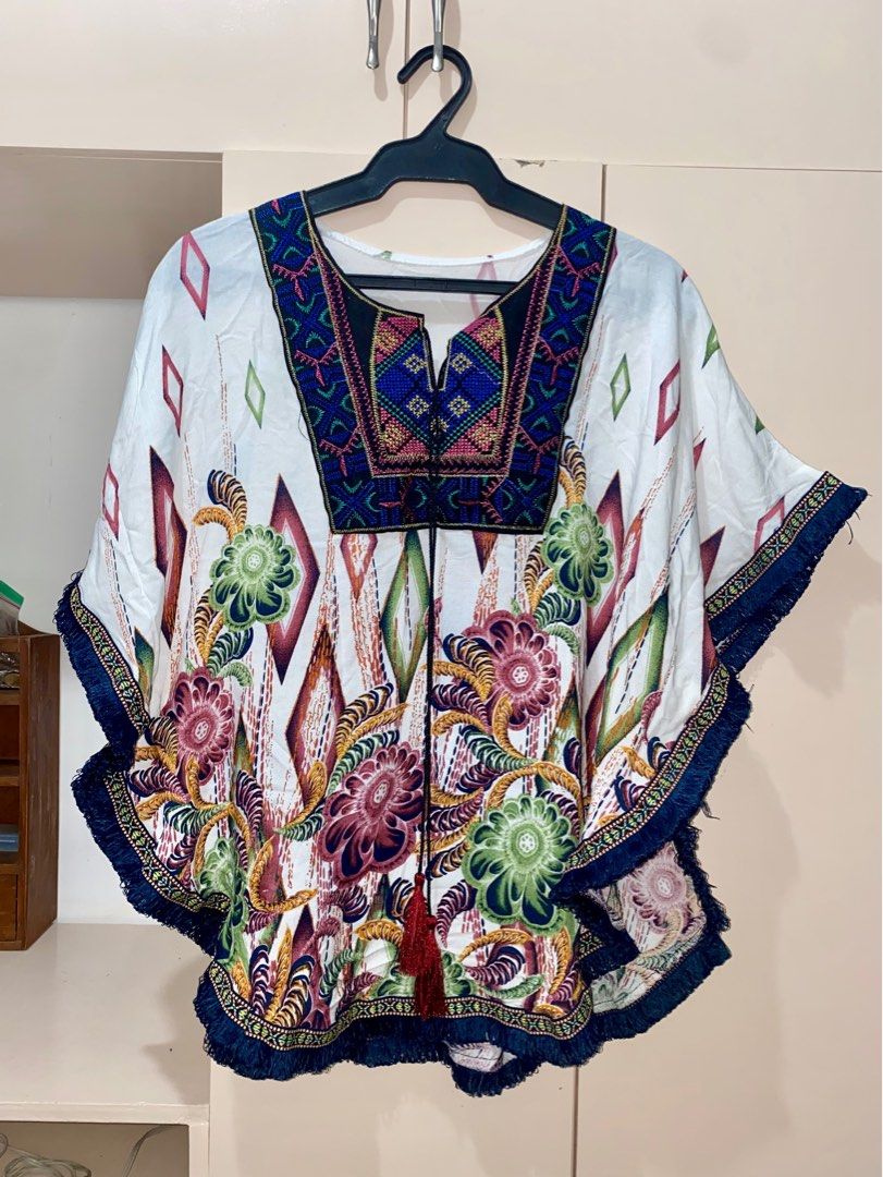 Printed Cape Blouse with Tie Detail (Category: Blouses) located in Cavite. Submitted by a_second.chance (Listing ID 1334387908, Image 1). Description: All items are original unless stated. Prices are negotiable, just make an offer. Mode of payment: - BPI - BDO - Gcash Delivery options: - Lalamove - J&T Delivery *shipping fee shouldered by buyer.