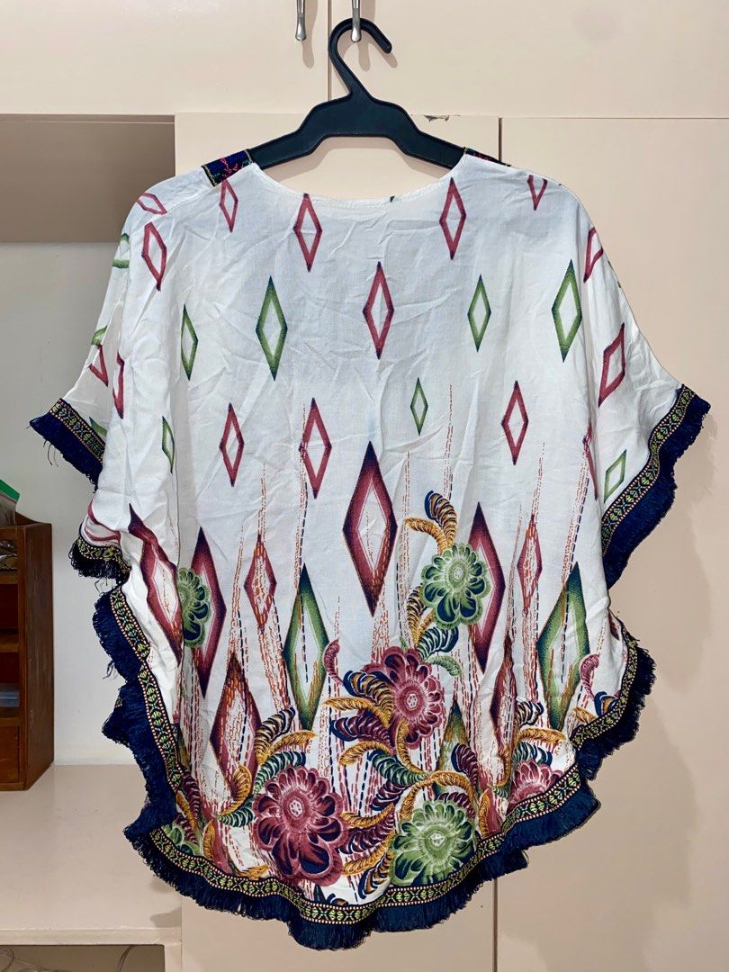 Printed Cape Blouse with Tie Detail (Category: Blouses) located in Cavite. Submitted by a_second.chance (Listing ID 1334387908, Image 2). Description: All items are original unless stated. Prices are negotiable, just make an offer. Mode of payment: - BPI - BDO - Gcash Delivery options: - Lalamove - J&T Delivery *shipping fee shouldered by buyer.