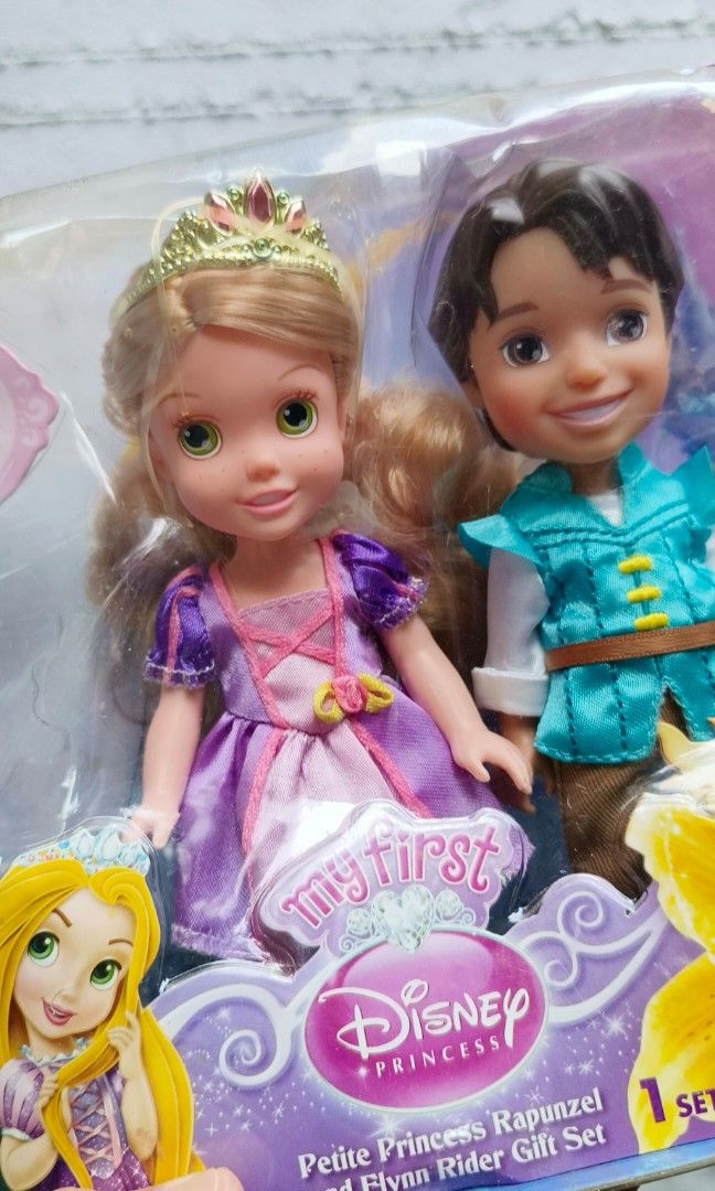 Rapunzel and Flynn (Category: Figurines & Statues) located in Baguio. Submitted by ukay_district (Listing ID 1334480565, Image 2). Description: Disney dolls Rapunzel and Flynn damaged box but dolls are still sealed 480.