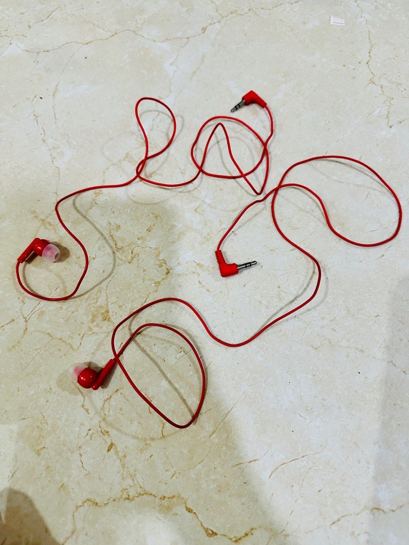 Red Wired Earphones (Category: Headphones & Headsets) located in Binan City. Submitted by fashiongossiponlineboutique (Listing ID 1334391375, Image 1). Description: red wired earphones in-ear buds with a 3.5mm audio jack on both ends intended for personal audio listening Take both for 50.
