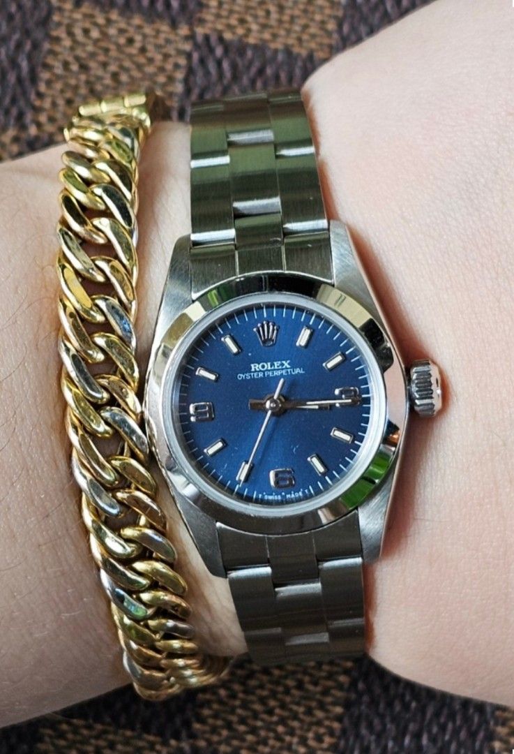 Rolex ladies Royal blue dial (Category: Luxury Watches) located in Manila. Submitted by shyysandig (Listing ID 1334494719, Image 3). Description: FS: Rolex Oyster Perpetual Steel Royal Blue Dial Model 67180 Caliber 2130 26mm Year 1997 With box.