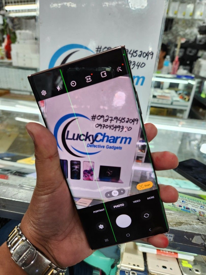 Samsung Galaxy Note20 Ultra 5G (Category: Samsung) located in Manila. Submitted by lucky.charm.gadgets (Listing ID 1334489683, Image 3). Description: Samsun Note20 Ultra 5G 12gb/256gb (PLEASE SEARCH MO NALANG FULL SPECS) NTC APPROVED NO REPAIR HISTORY 98% SMOOTH NOTE* May LCD LINE SA GITNA AT PINAKA GILID BINULUGAN ko para may idea ka .yan lang honest issue kaya mura test to sawa bago bayaran .pede pang spare phone pede rin sa mga pang praktikal.