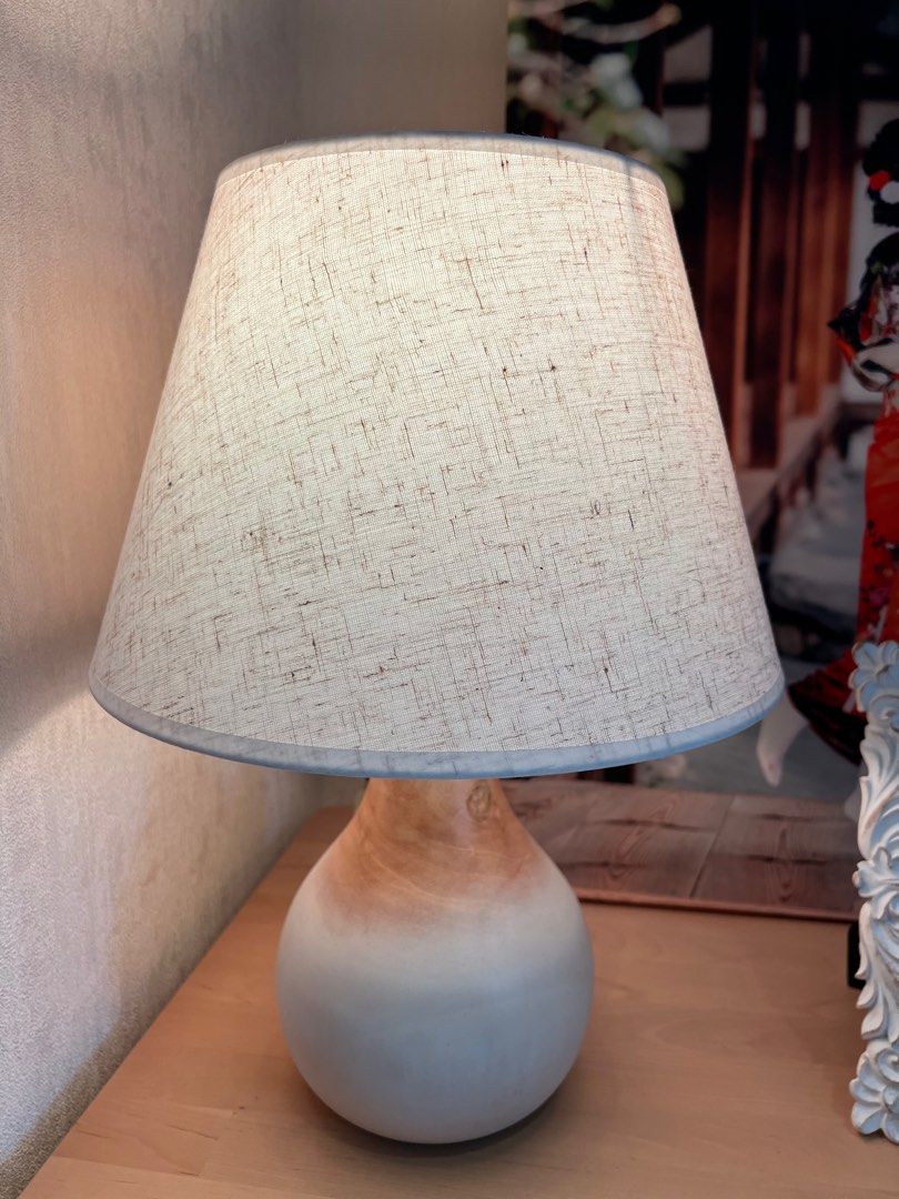 Scandinavian wooden lamp with linen lampshade (Category: Lighting) located in Singapore. Submitted by victoria.07 (Listing ID 1334393233, Image 3). Description: Able to adjust the shade of the light (comes with brand new Xiaomi LED smart light bulb) .