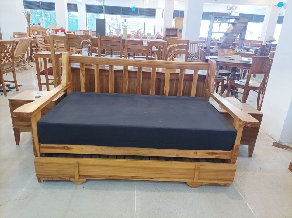 Solid Teak Wood Sofa Bed Furniture (Category: Sofas) located in Caloocan City. Submitted by anntinemaddelaaa00 (Listing ID 1334387458, Image 3). Description: ITEM: Handcrafted Solid Teak Wood Sofa Bed Furniture SERIES: Gold Teak (Indoor Series) MAIN MATERIAL: Teak Wood (Tectona Grandis) FINISHING: N. Cellulose APPROXIMATE DIMENSIONS: (size may slightly vary due to its handcrafted nature) Sofa Form: 160 x 93 x 90 cm Bed Form: 160 x 180 x 90 cm PAC