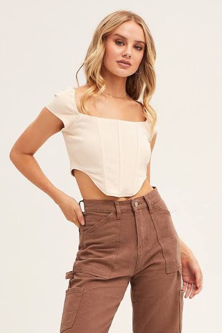 White Corset Top (Category: Blouses) located in Angono. Submitted by chapter_nine (Listing ID 1334070331, Image 1). Description: Small to Semi Med.