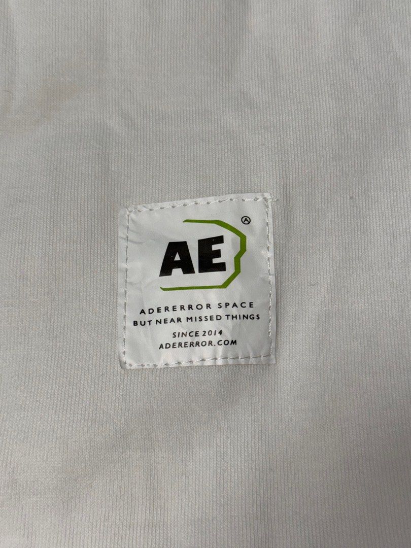 ader error tee (Category: Tshirts & Polo Shirts) located in Singapore. Submitted by roystiori (Listing ID 1334700457, Image 2). Description: ader error parody tee, oversized fit very comfy material.