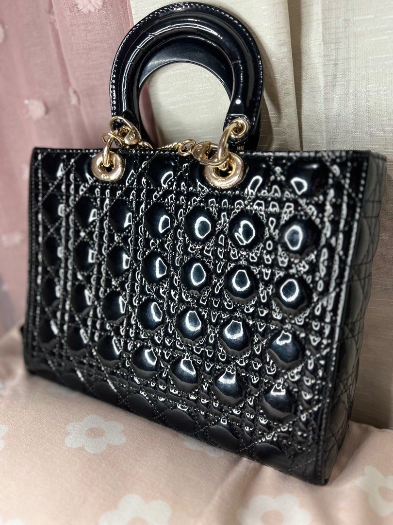 Bag (Category: Luxury Bags & Wallets) located in Manila. Submitted by kariess (Listing ID 1334606630, Image 3). Description: Hii friends! I’m selling my Large Lady Dior Patent Cannage Calfskin (in black). I got this 2 years ago but I only used it 3 times. The price is negotiable, just message me!.