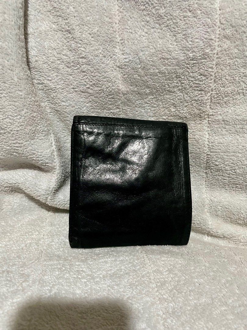Dior vintage leather wallet (Category: Luxury Bags & Wallets) located in San Pablo. Submitted by prelovedbymistyblue (Listing ID 1334659708, Image 2). Description: Authentic Dior wallet. With signs of use on the leather and minimal fading on the hardware. Genuine leather. Soft leather. Trifold. made in Spain. Selling low for 2500 for an authentic Dior wallet, down to 2100..