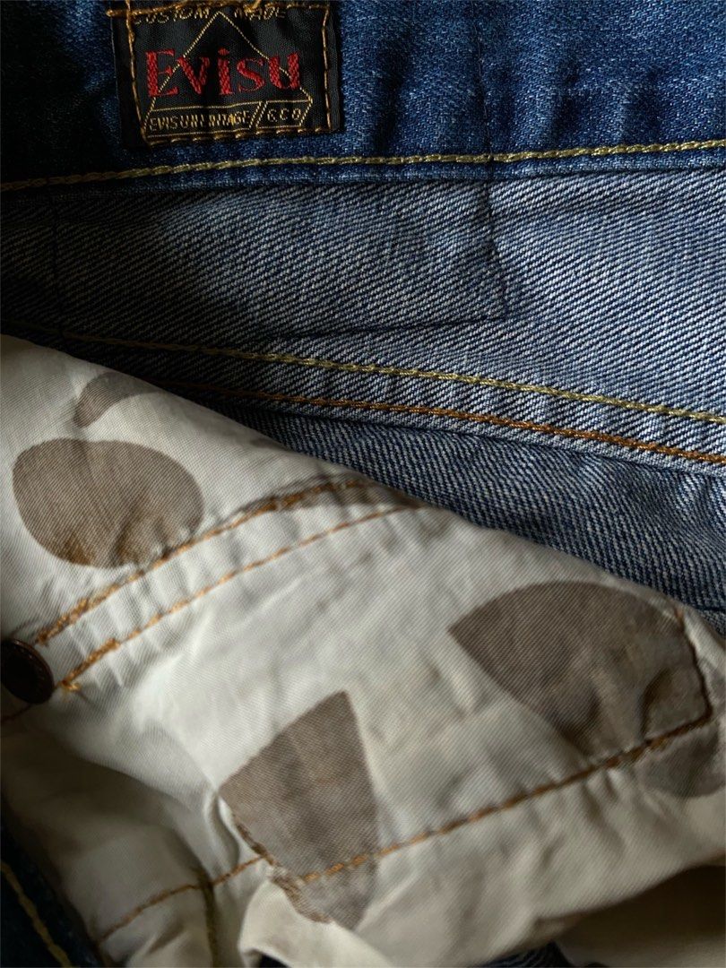 Evisu Daicock Jeans - Big Logo (Denim) (Category: Jeans) located in Antipolo. Submitted by pamanathrifts (Listing ID 1334588876, Image 3). Description: Condition: Very Good Waist: 30” Length: 41” Leg Opening: 7” Issue: Cracked print.