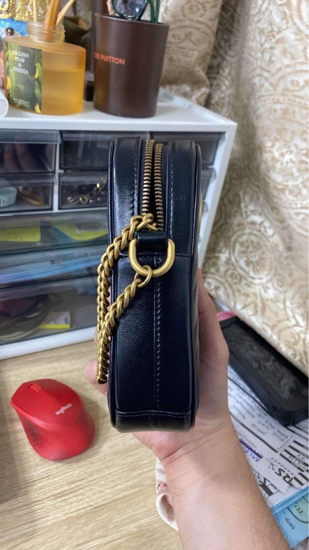 Gucci Marmont cellphone sling bag (Authentic) (Category: Luxury Bags & Wallets) located in Cagayan de Oro. Submitted by eloisag (Listing ID 1334558245, Image 2). Description: Selling my preloved authentic gucci marmont sling bag. Bought from a popular online seller. No inclusions. Slightly negotiable. Moneyback guaranteed if proven fake. RFS: decluterring. Too many black crossbody bags.