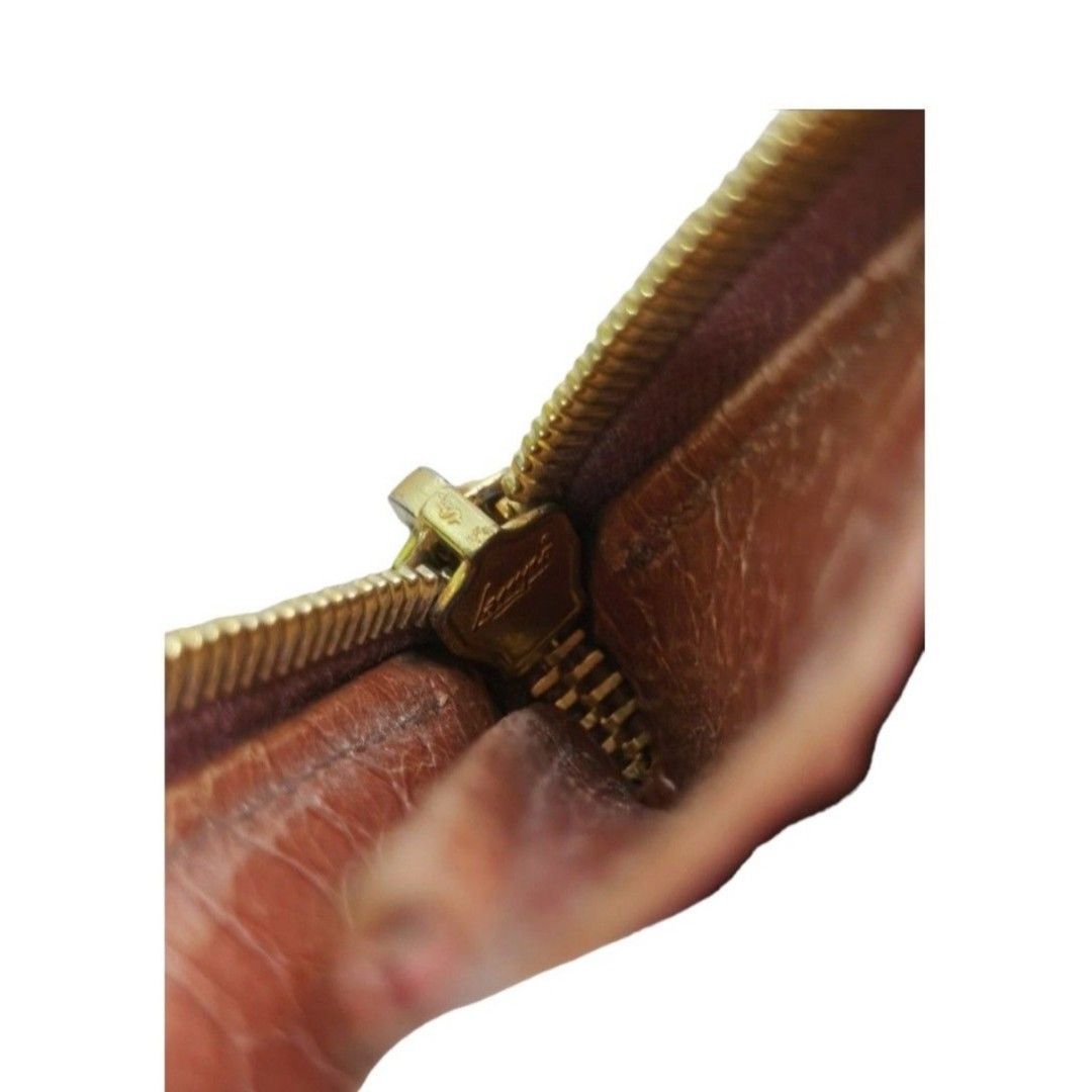 MiuMiu (Category: Luxury Bags & Wallets) located in Quezon City. Submitted by maneradesignersboutique (Listing ID 1334637739, Image 3). Description: Money back guarantee 💯% Guaranteed authentic Brand: MIUMIU slim zippy wallet Color: brown orange croc skin Size: long slim Condition: 8/10 never been spa - USED Inclusions: wallet only Rank review by the criterion of our shop about the products condition and level. 10 : Brand-new or New with tag 9 :