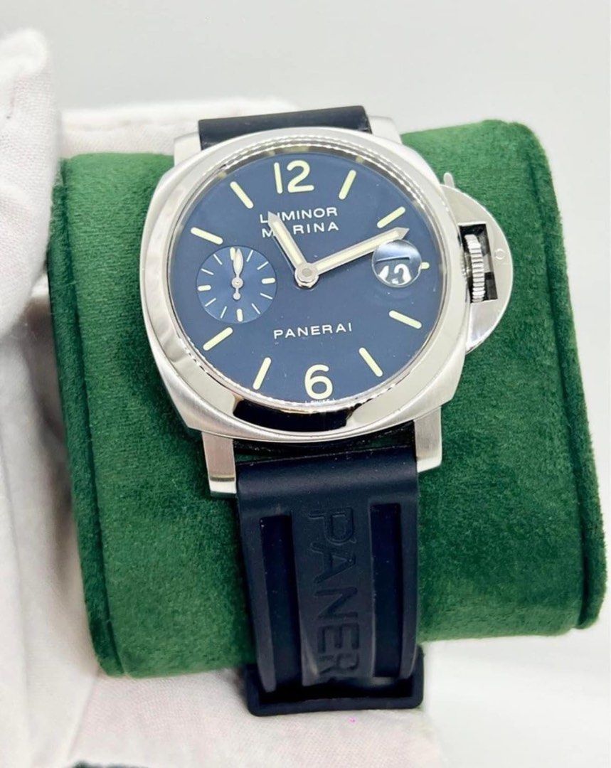 panarei (Category: Luxury Watches) located in Cabanatuan. Submitted by albertgonzales27 (Listing ID 1334598913, Image 3). Description: Panerai Luminor Marina Rare Blue Dial Reference PAM00070 2005 year model, H series 40mm case size Automatic movement Black rubber strap deployant clasp 9/10 mint condition Watch and Panerai travel case Open for verification Trade offers accepted up or down P195,000 only fixed.